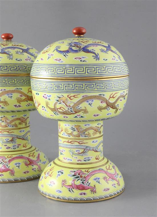 A pair of Chinese yellow ground altar vessels and covers, dou, iron red Daoguang seal marks and of the period (1821-50), height 27.5cm,